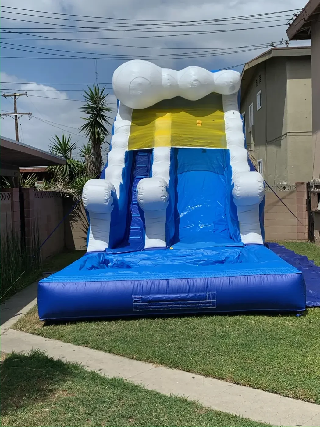 White yellow and blue inflatable slide
